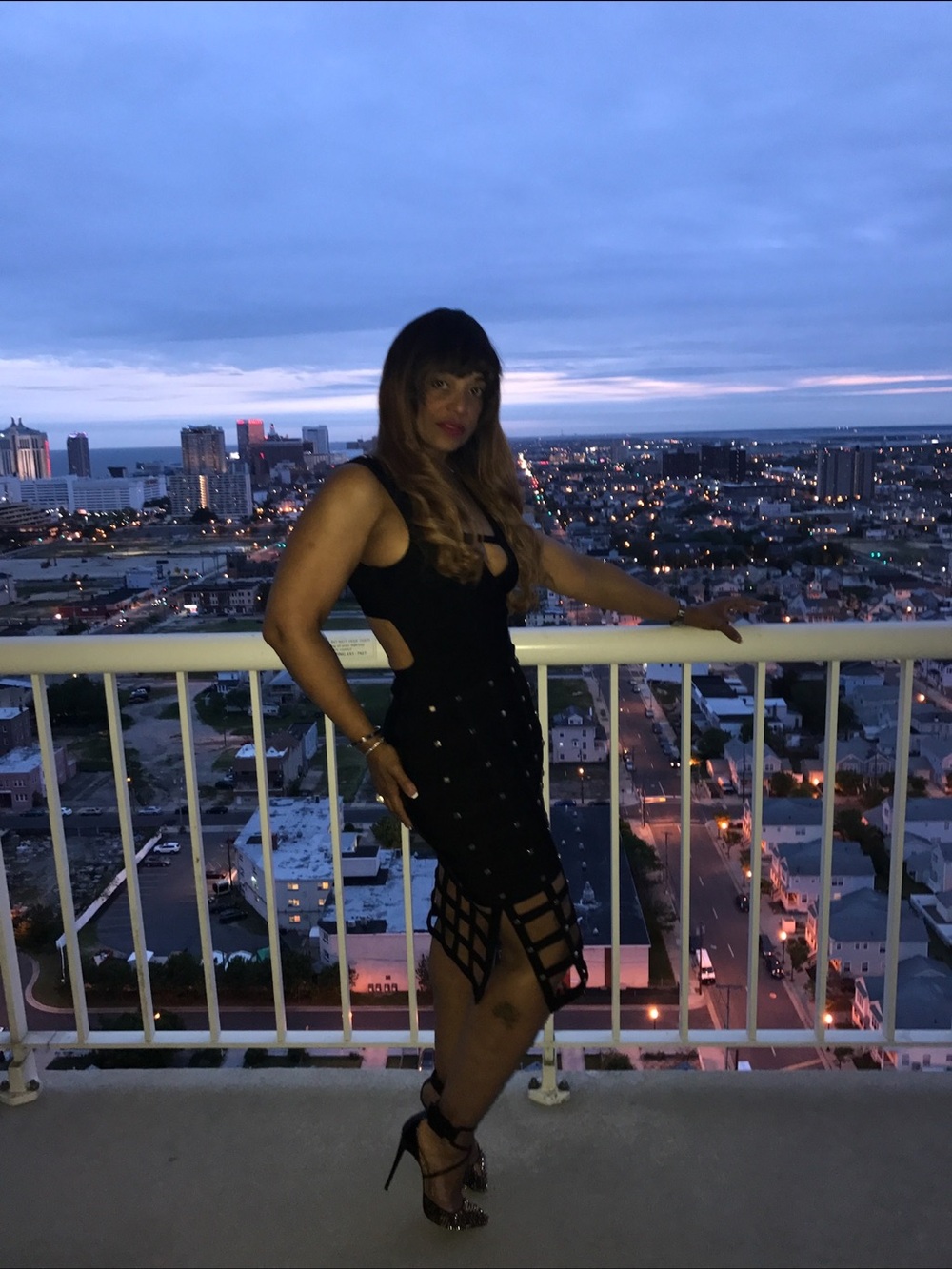 Sleek Black Midi Bodycon Dress with Cutout Lattice Hem